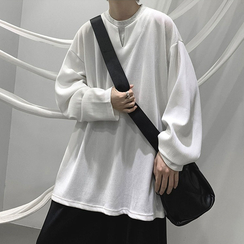 Dame afslappet oversized pullover med struktureret design og moderne V-udskæring Stilla