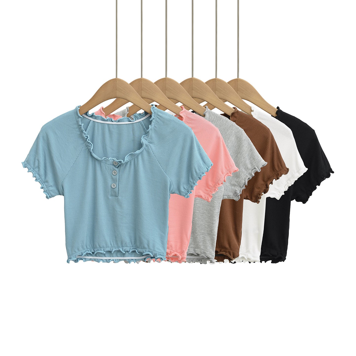 Dame cropped T-shirt med flæsedetaljer og knaplukning Stilla