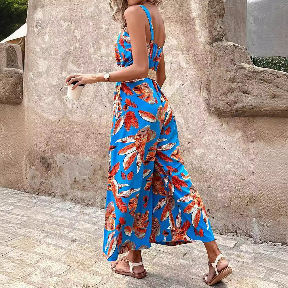 Dame jumpsuit med floral design og tætsiddende bælte Stilla