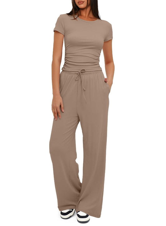 Dame fritids-jumpsuit med taljerbart design og afslappet snit Stilla