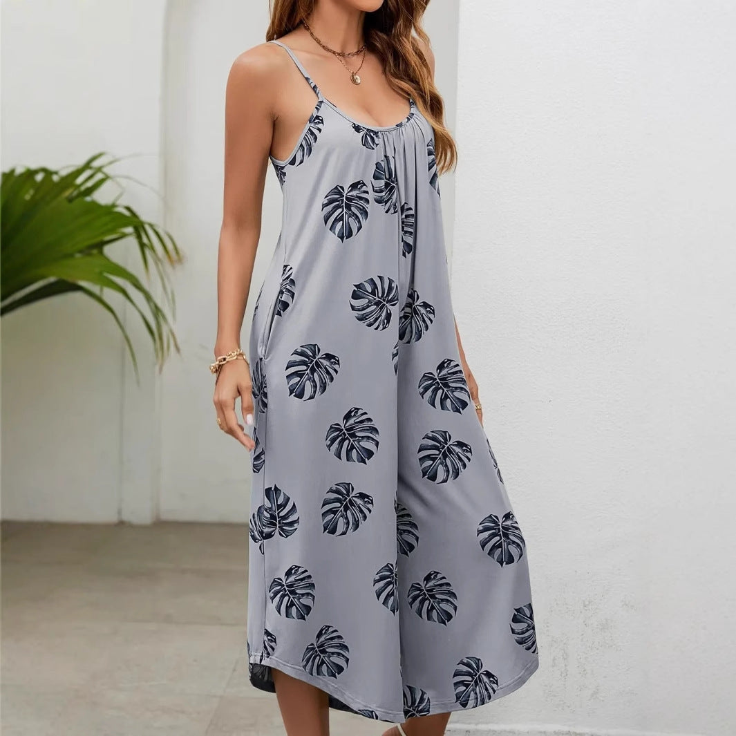 Dame luftig sommer jumpsuit med blomsterprint og lommer Stilla