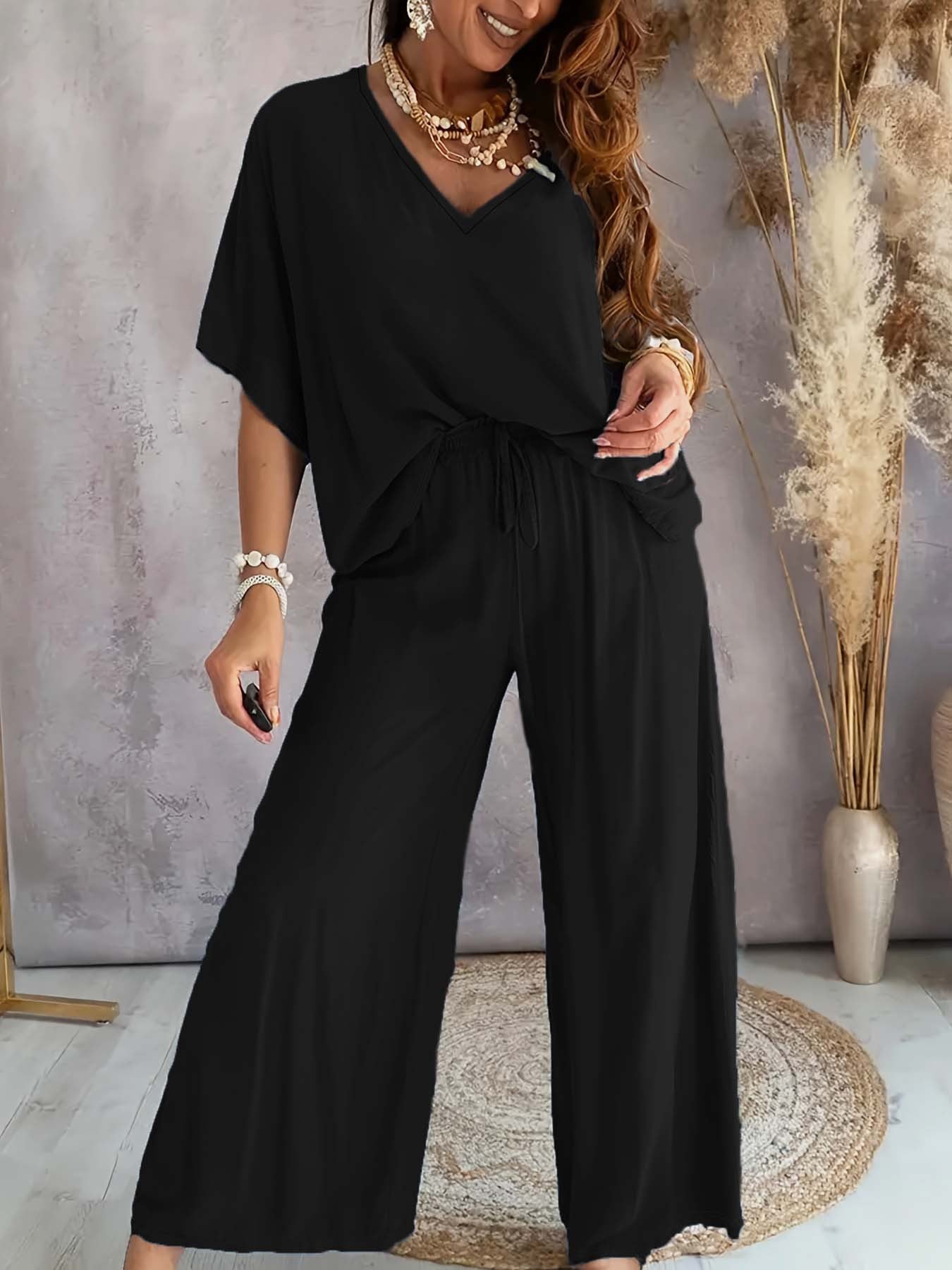 Dame afslappet jumpsuit med bred pasform og elastisk talje Stilla