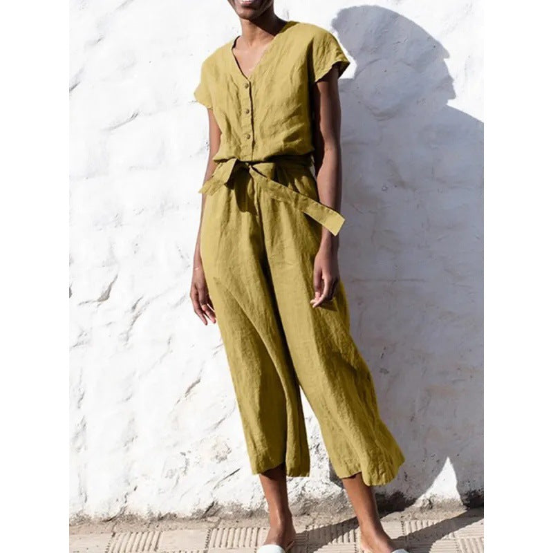 Dame let jumpsuit med taljebind og knapdetaljer Stilla