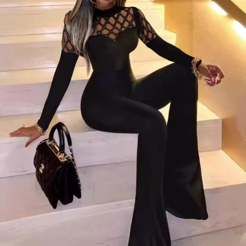 Dame jumpsuit med netlignende udskæringsdesign og elegante dekordetaljer Stilla