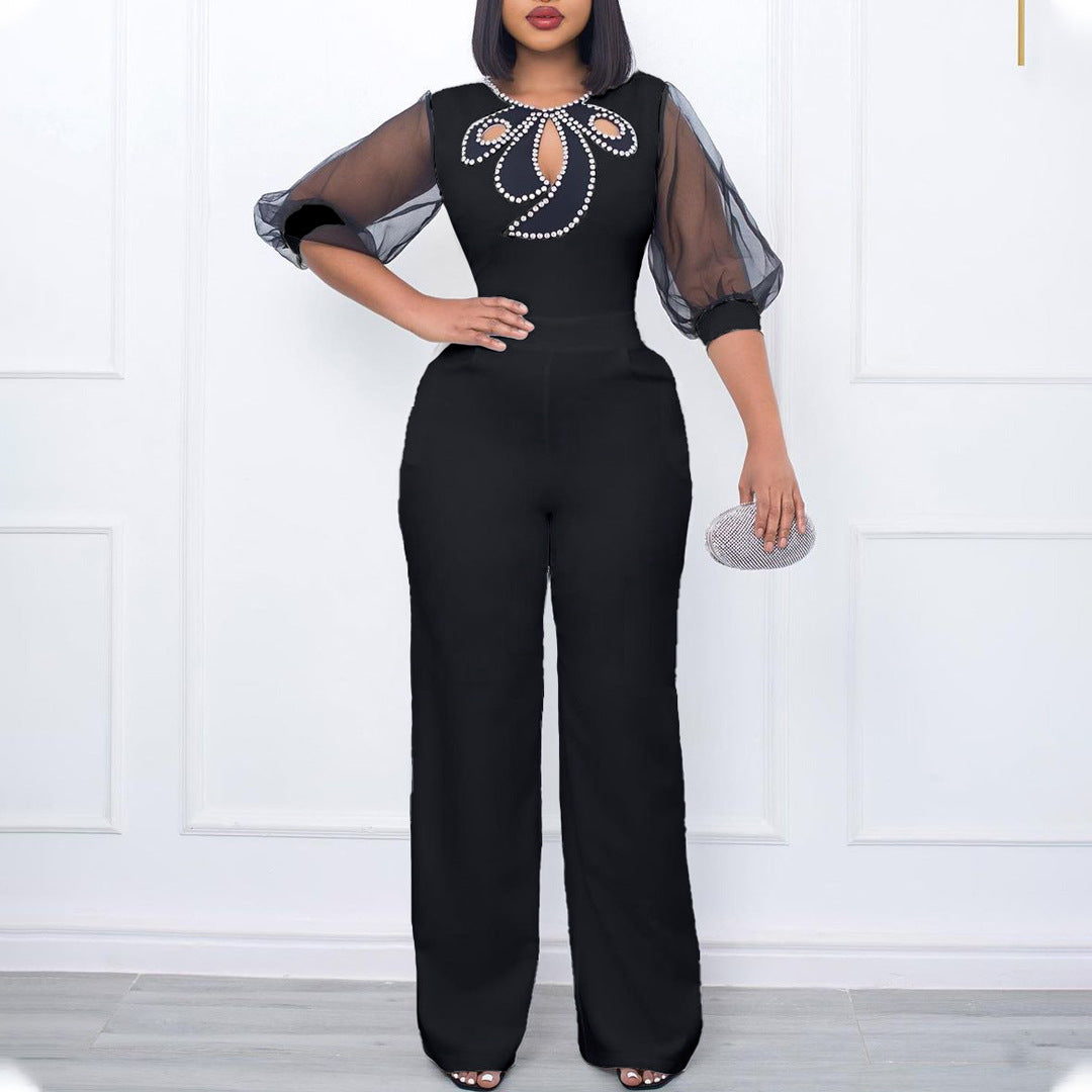 Dame Elegante Jumpsuit med gennemsigtige ærmer og smykker detaljer Stilla