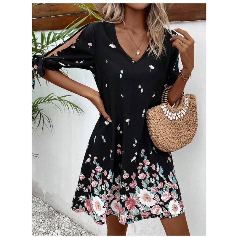 Dame afslappet blusekjole med floral design og loopærmer Stilla