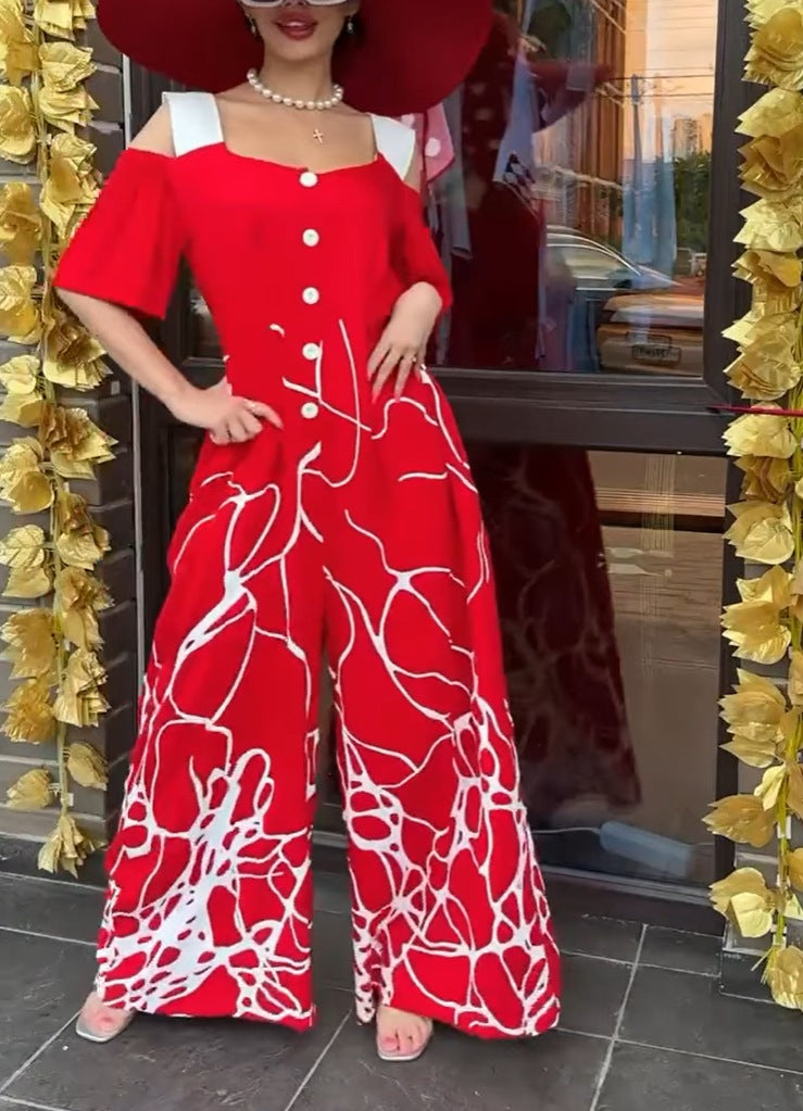 Dame jumpsuit med elegant snit og kreativt grafisk mønster Stilla