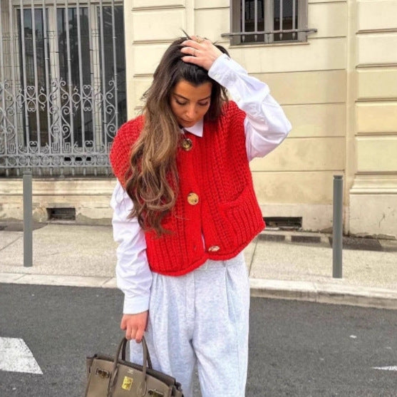 Dame strikvest med praktiske lommer og elegante knapdetaljer Stilla