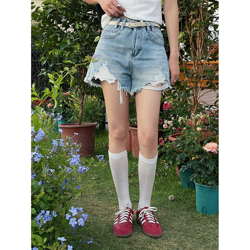 Dame Destroyed Denim-Shorts med afslappet snit og vintage-detaljer Stilla