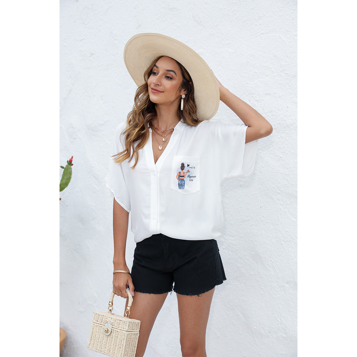 Dame afslappet bluse med dekorativ brysttryk Stilla