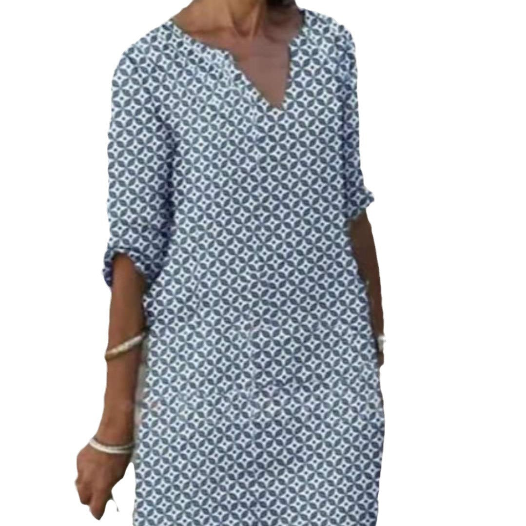 Dame afslappet skjortekjole med blomstermotiv og praktiske sidelommer Stilla