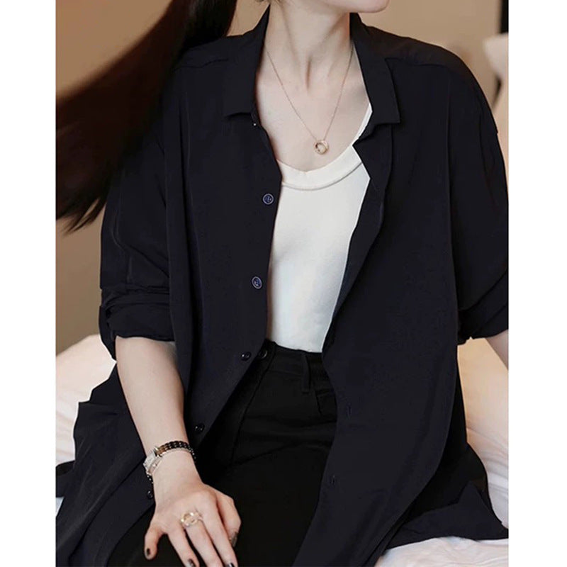 Dame afslappet bluse med ballonformet snit og elegant knaplukning Stilla