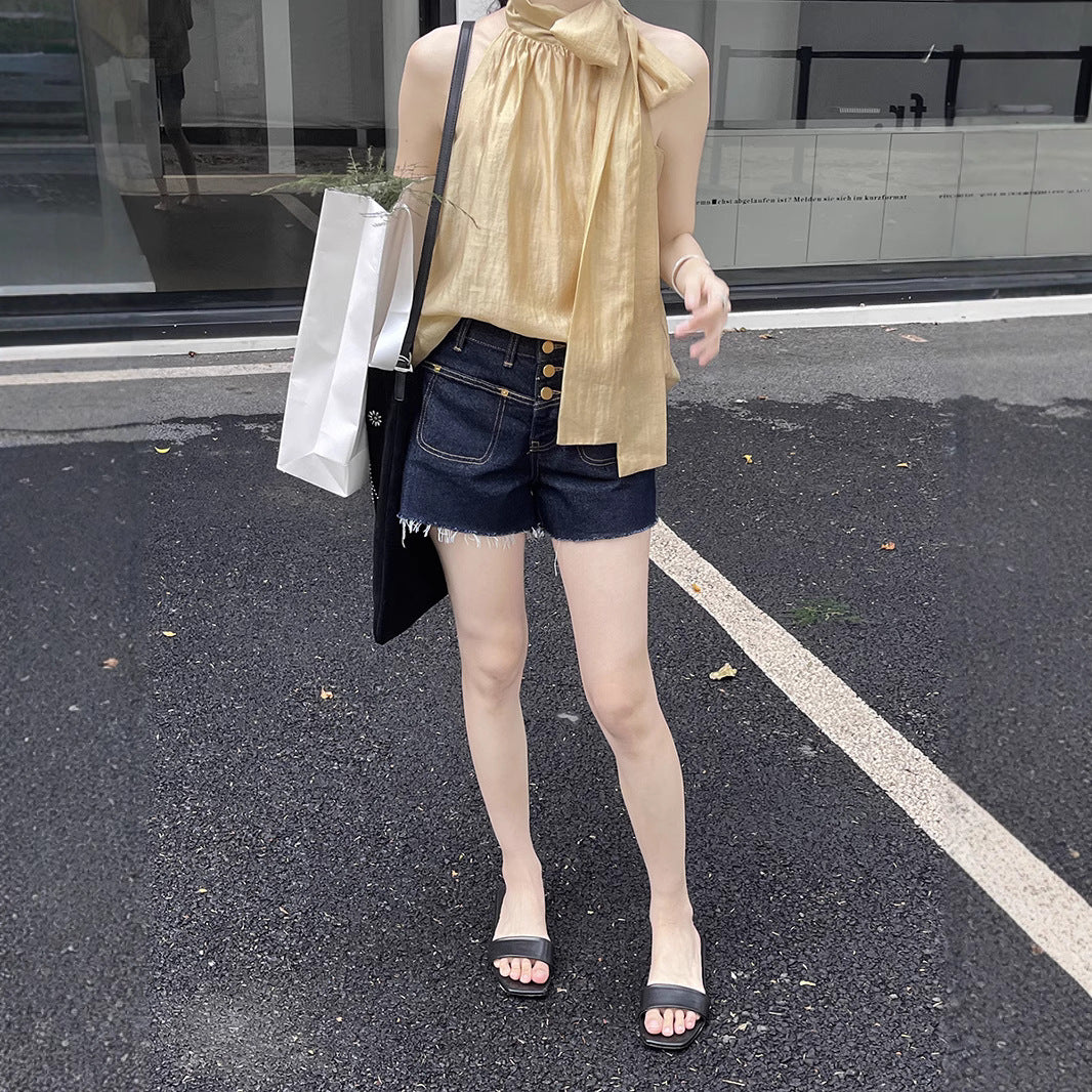 Dame Denim-shorts med knapdetalje og afslappet design Stilla