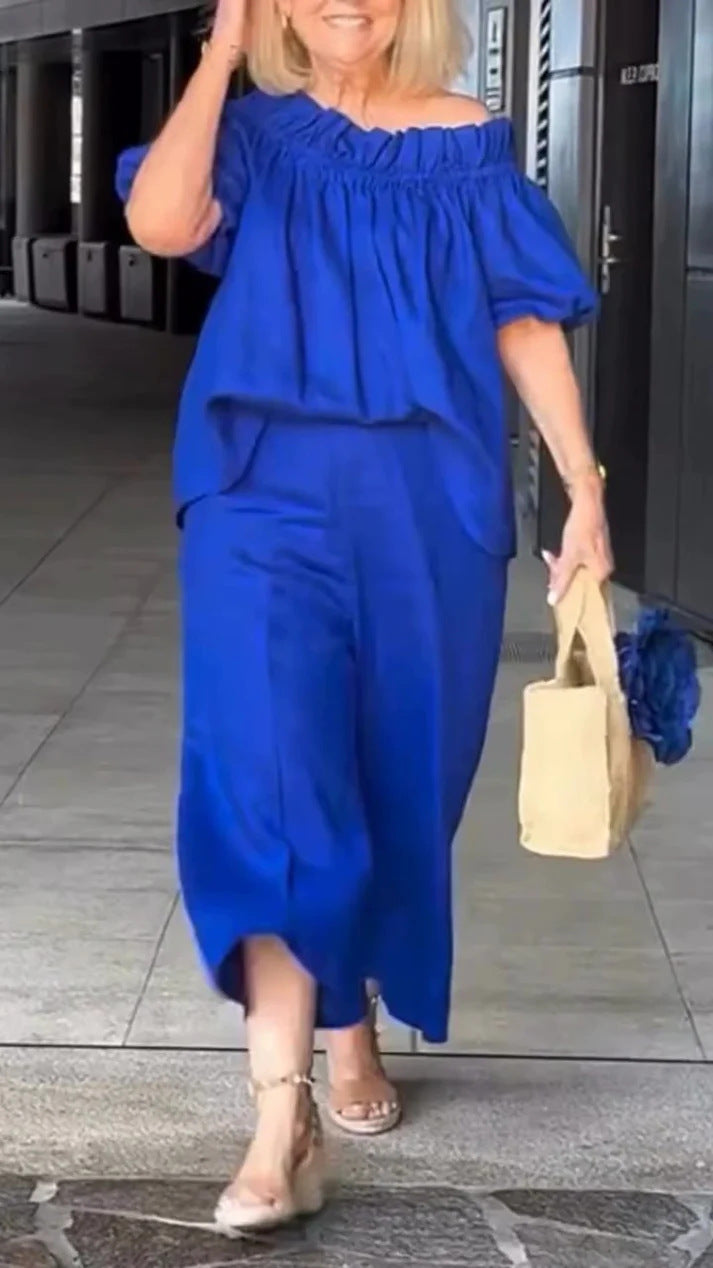 Dame luftig jumpsuit-sæt med voluminøse ærmer og raffineret taljering Stilla