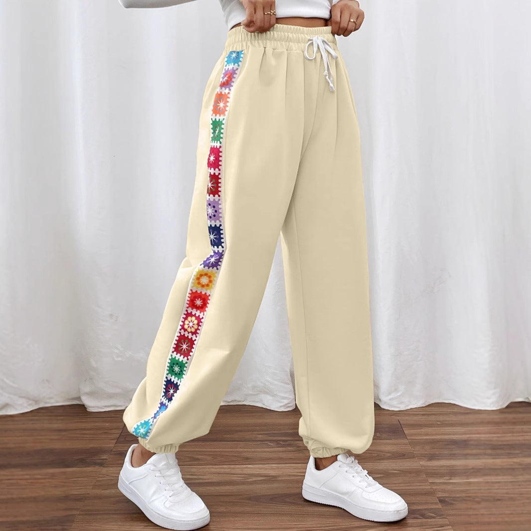 Dame joggingbukser med floral sidebånd Stilla