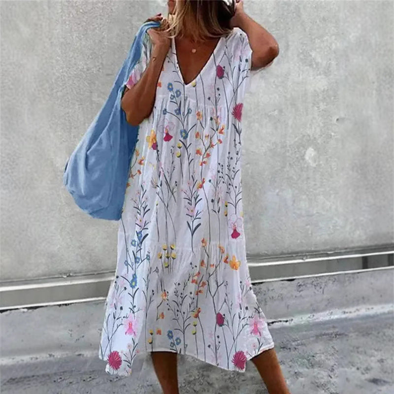 Dame afslappet sommerkjole med V-hals og flæsedetaljer Stilla