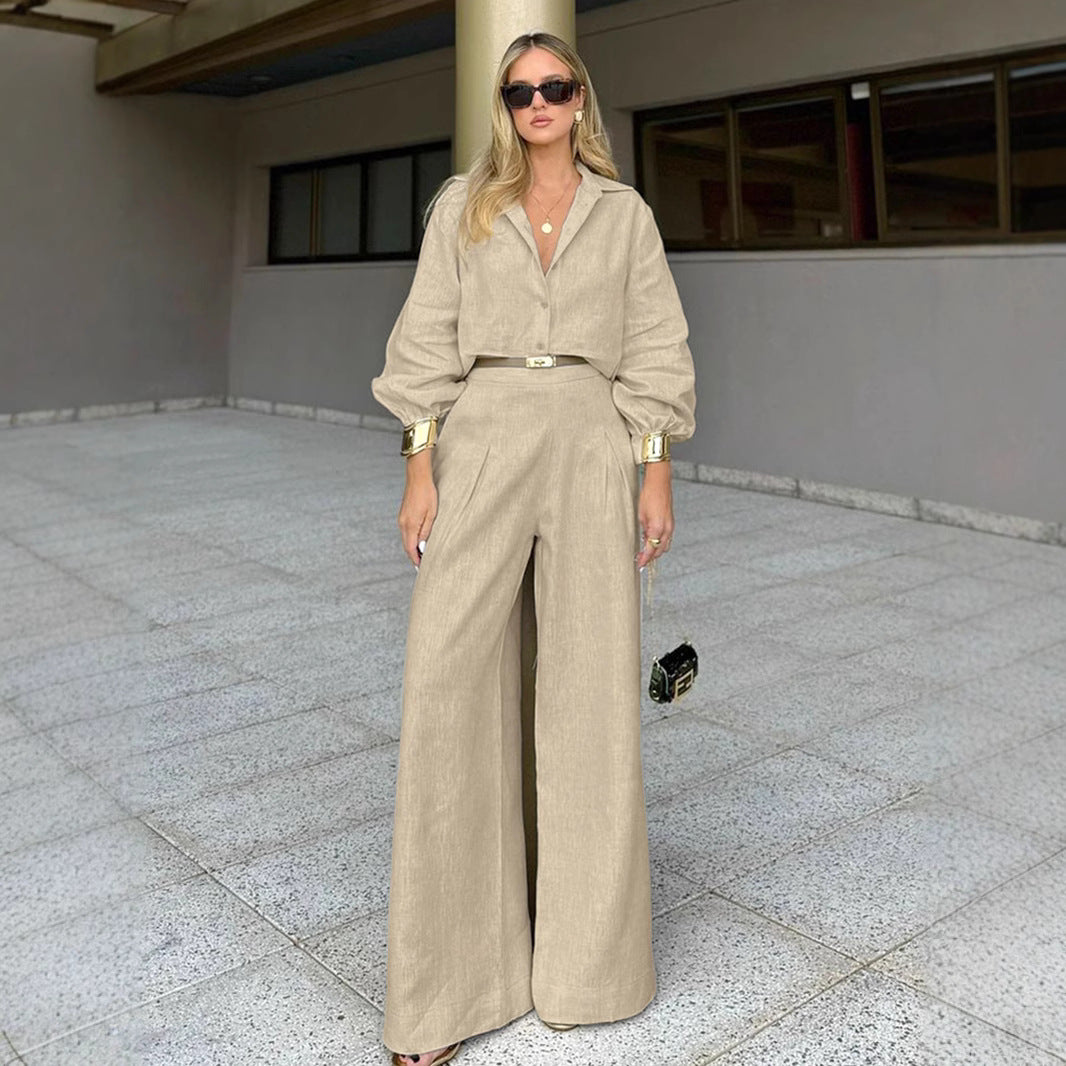 Dame elegant erhvervssæt med figursyet bluse og løst skåret bukser Stilla