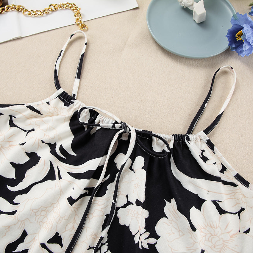 Dame elegant bluse- og kjolesæt med floralt mønster og detaljerede ærmeafslutninger Stilla