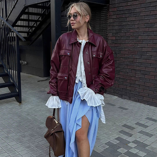 Dame oversized kunstlæderjakke med funktionelle lommer og elastisk bund Stilla