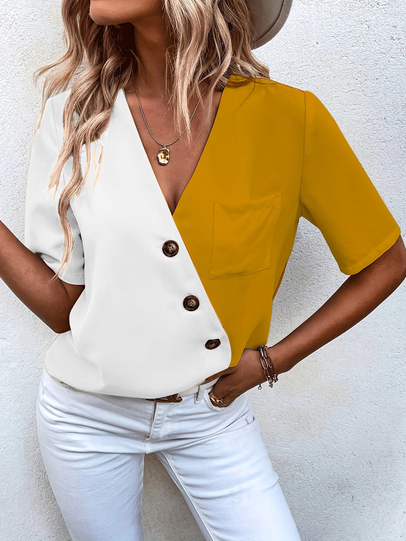 Dame designer-bluse med asymmetrisk snit og elegant knaplukning Stilla