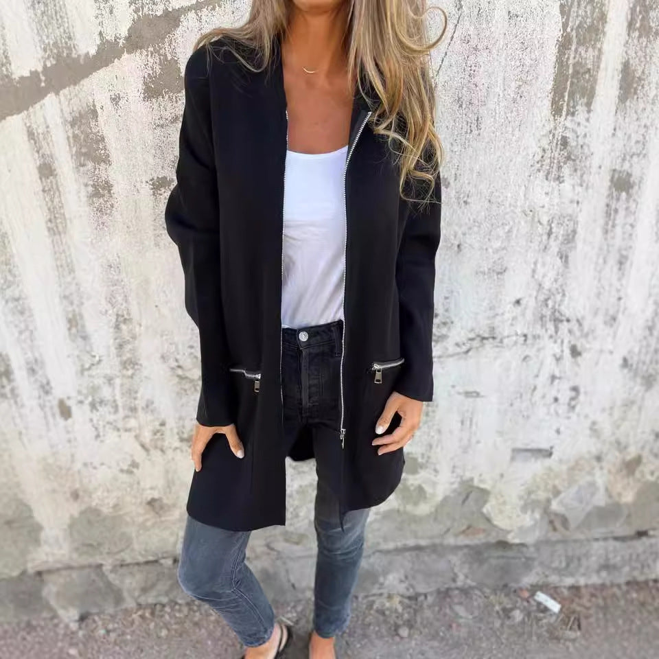 Dame afslappet Langjakke med praktisk lynlås og sidelommer Stilla