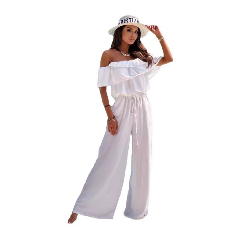 Dame jumpsuit med flydende snit og elastisk taljebånd Stilla