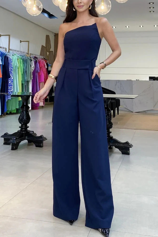 Dame Elegant jumpsuit med asymmetrisk skæring og bredt ben Stilla