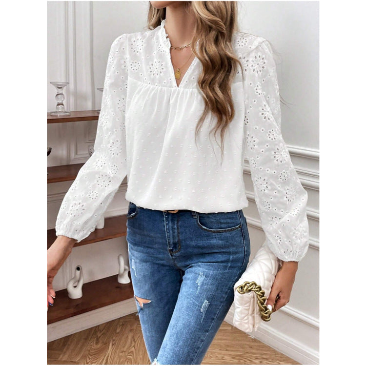 Dame elegant bluse med florale hulmønstre og pufærmer Stilla