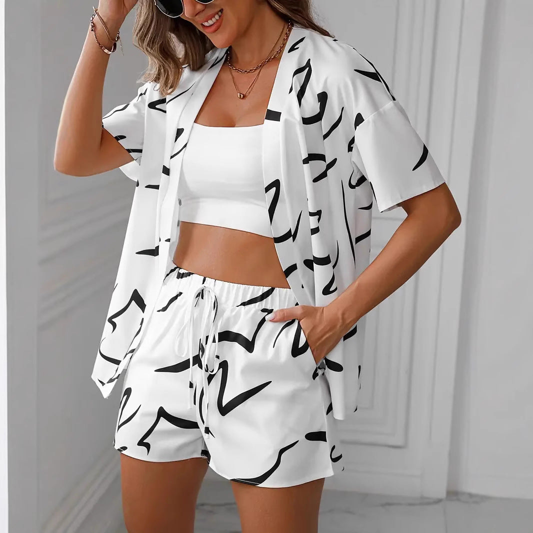 Dame Zvejedele deltid kombination med løs bluse og shorts i tropisk design Stilla