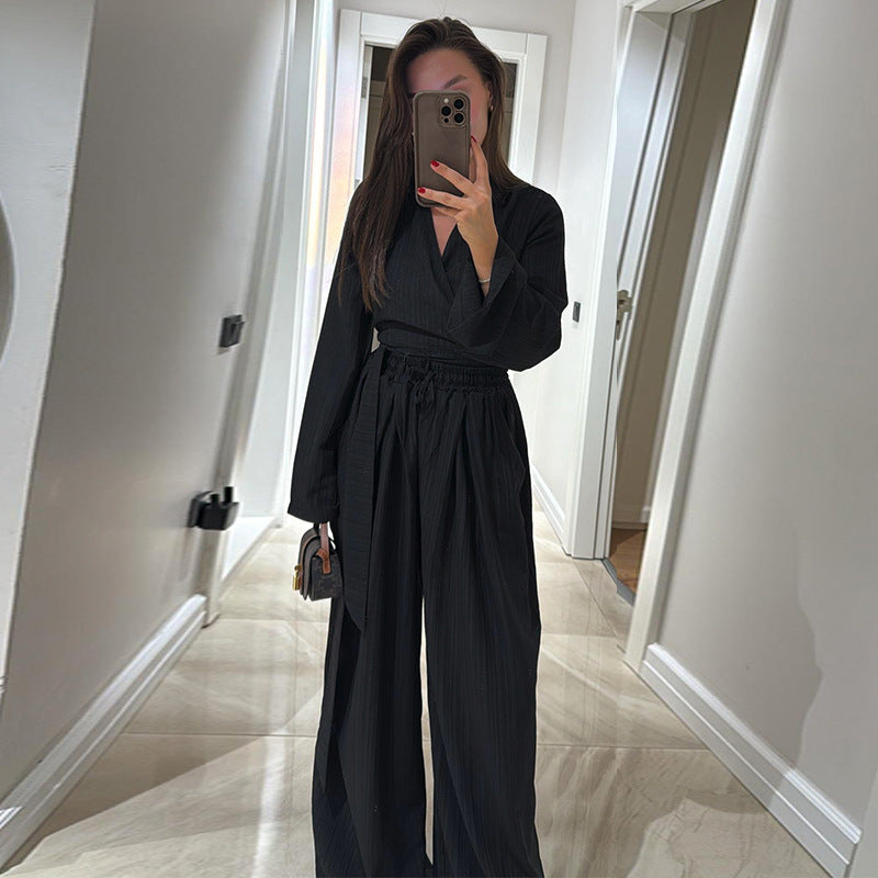Dame Elegant Jumpsuit med V-hals og bredt ben Stilla