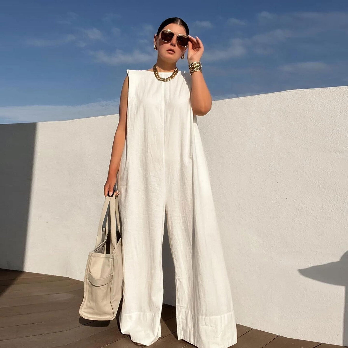 Dame jumpsuit med bred ben og ærmeløs design Stilla