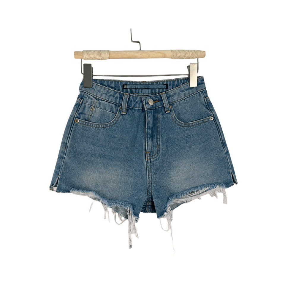Dame Destroyed Denim-Shorts med høj talje og frynser Stilla