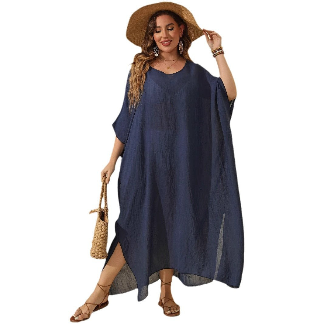 Dame afslappet strandkjole med asymmetrisk søm og praktiske sideslids Stilla