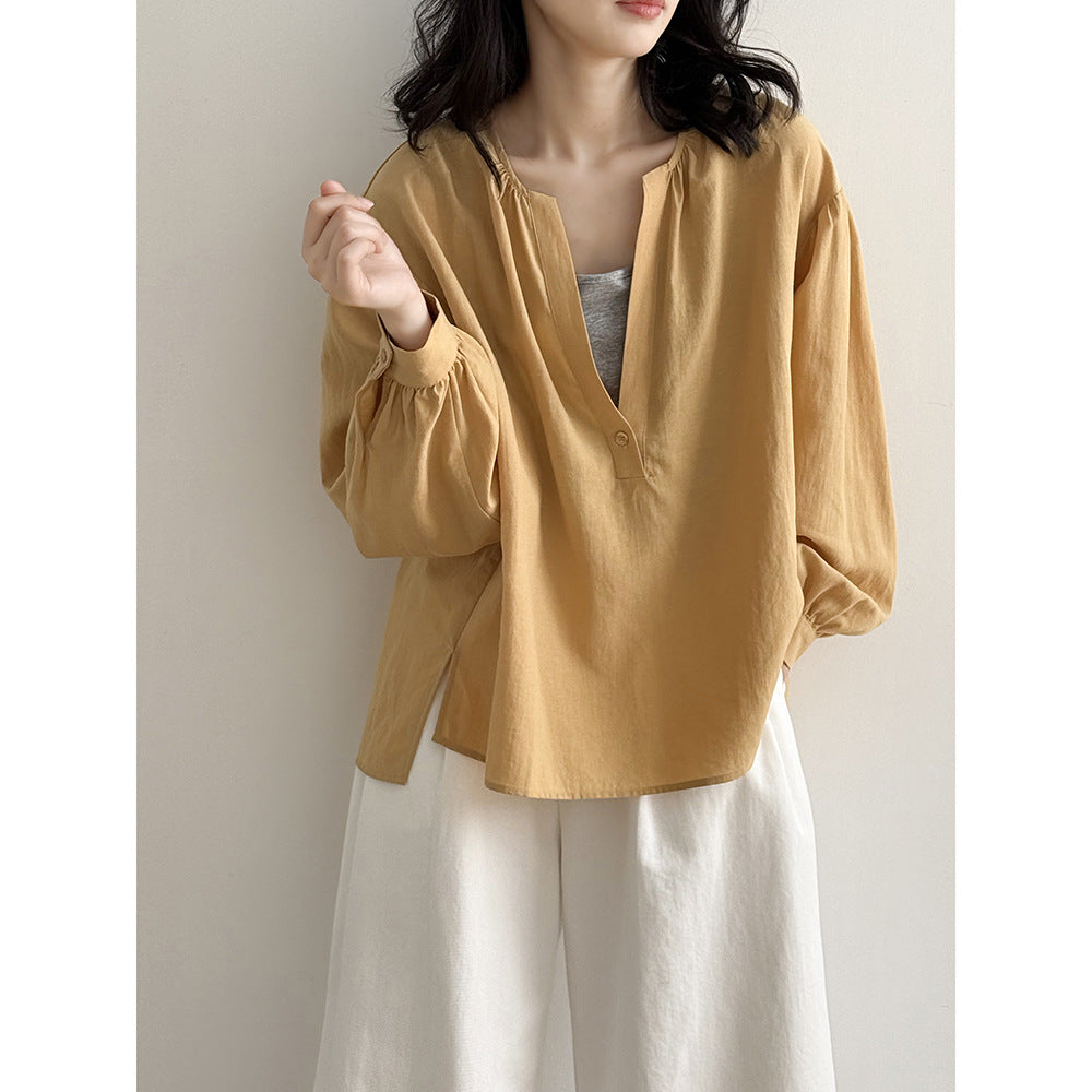 Dame afslappet bluse med ståkrave og elegant knappemulighed Stilla