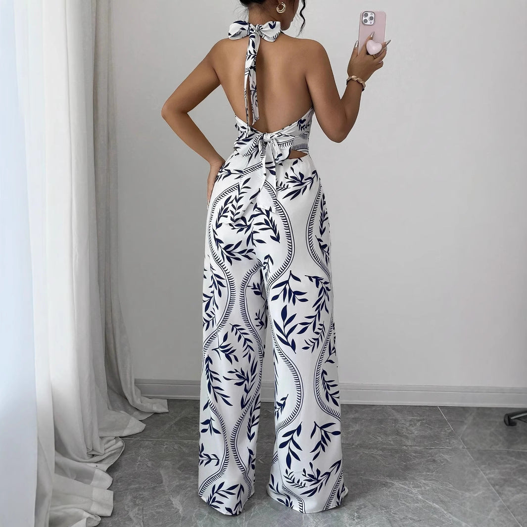 Dame jumpsuit med blomsterprint og smart V-hals Stilla