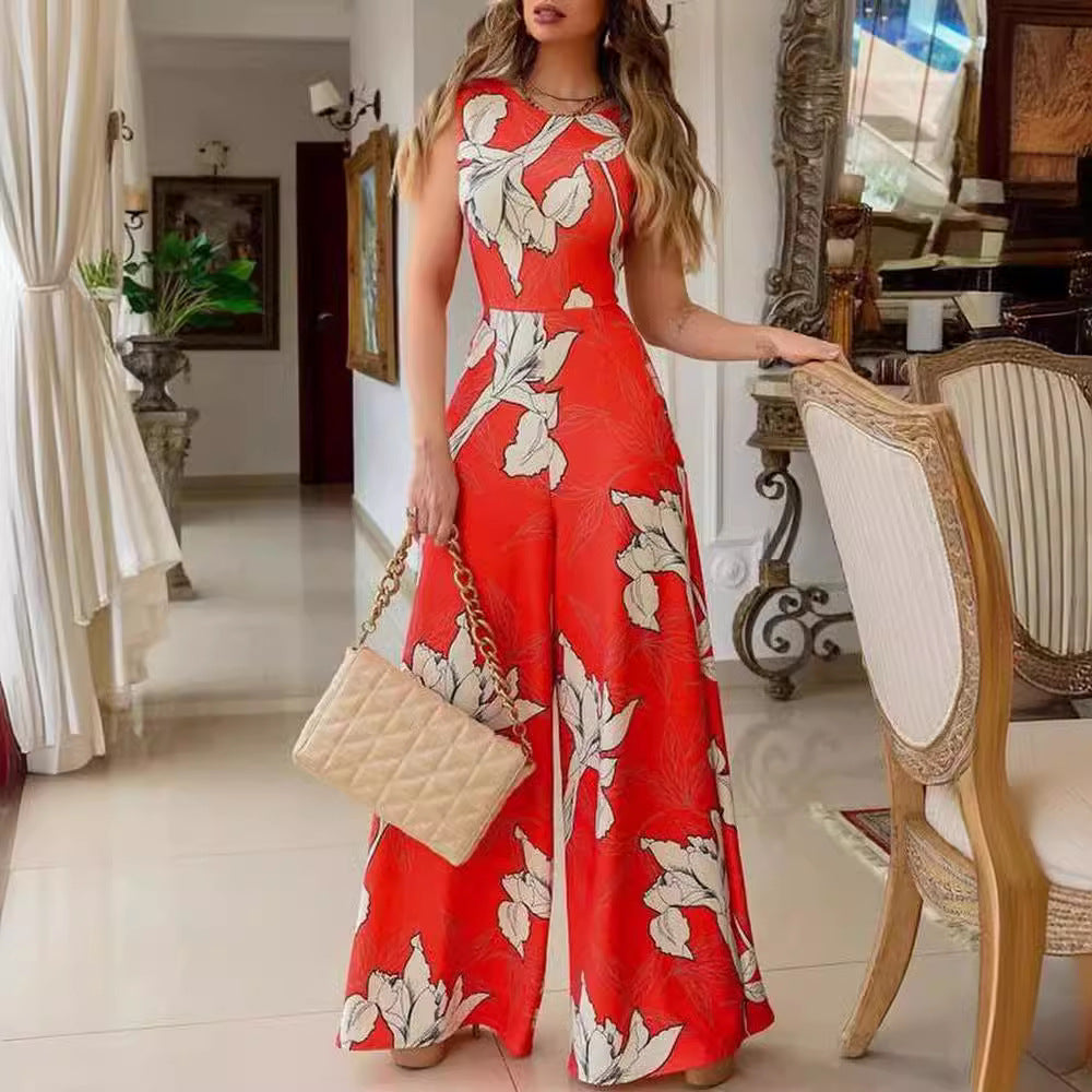 Dame jumpsuit med floral design og bred ben Stilla