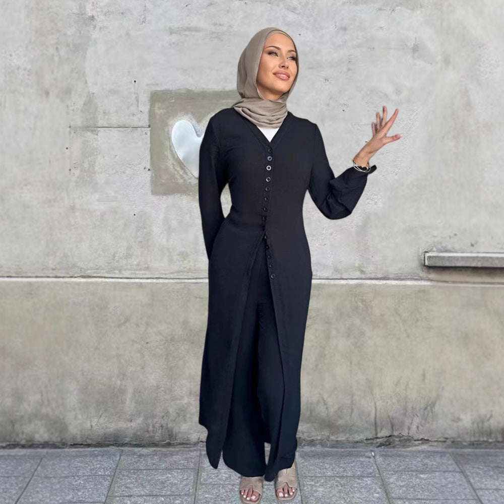 Dame jumpsuit med elegant knapdesign og flydende snit Stilla