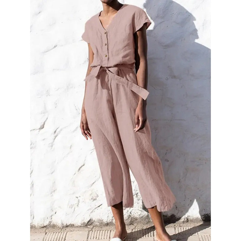 Dame let jumpsuit med taljebind og knapdetaljer Stilla