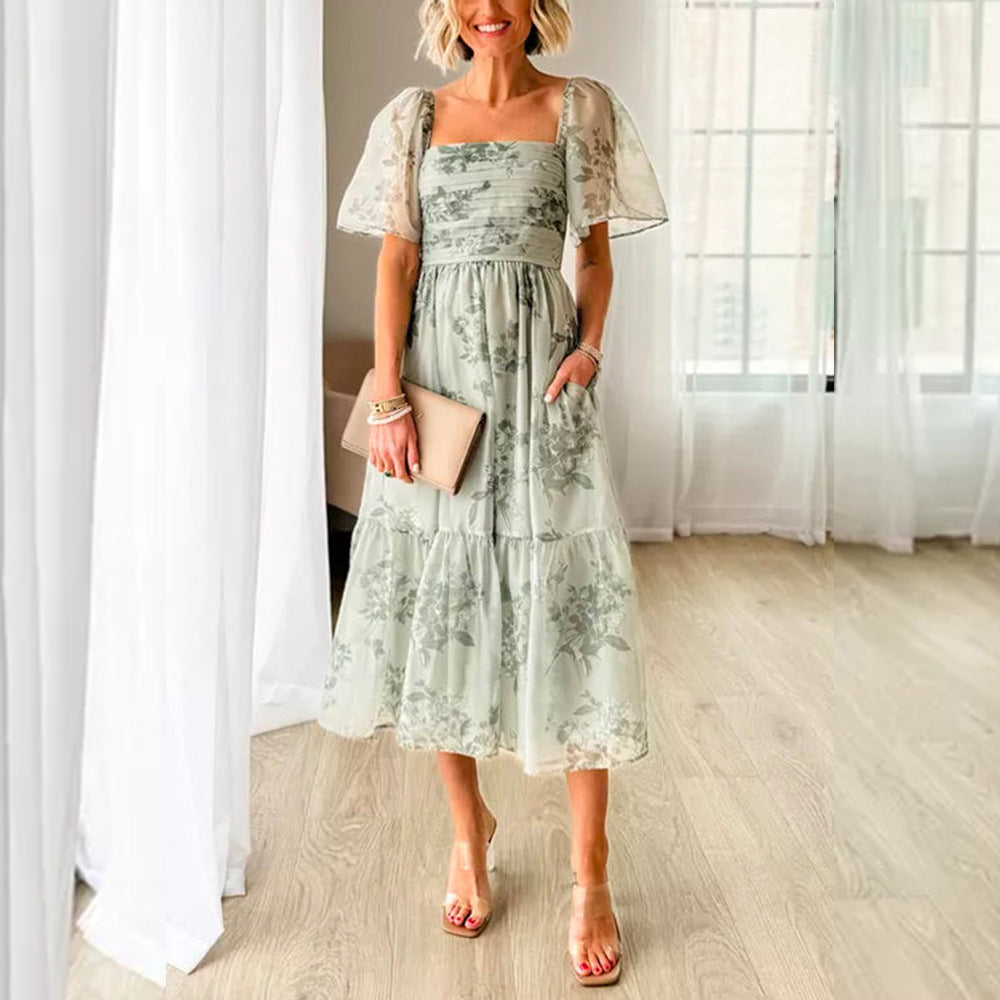 Dame Elegant blomsterkjole med gennemsigtige ærmer og taljering Stilla