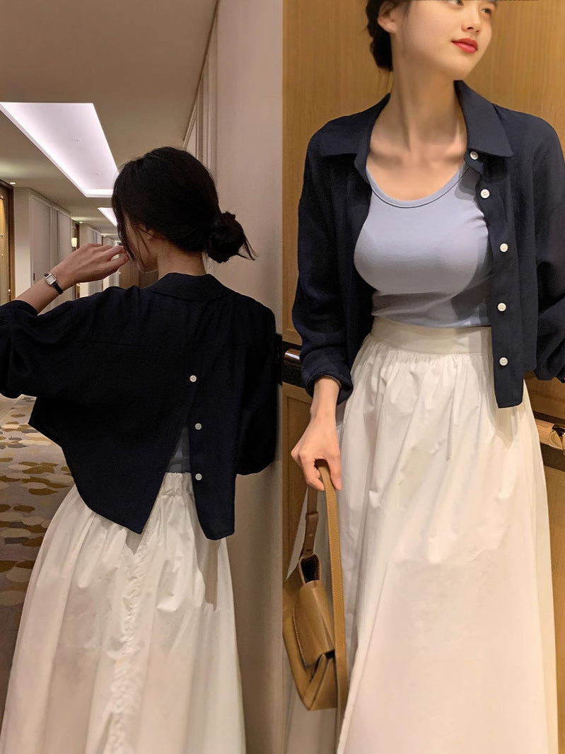 Dame cropped bluse med afslappet snit og slids bag Stilla