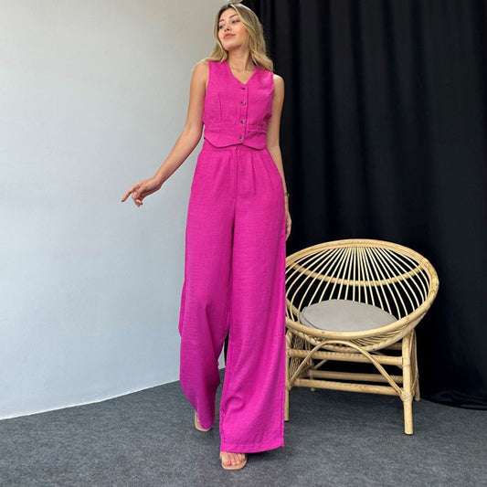 Dame mode og afslappet jumpsuit-sæt med figursyet snit og knapdetaljer Stilla