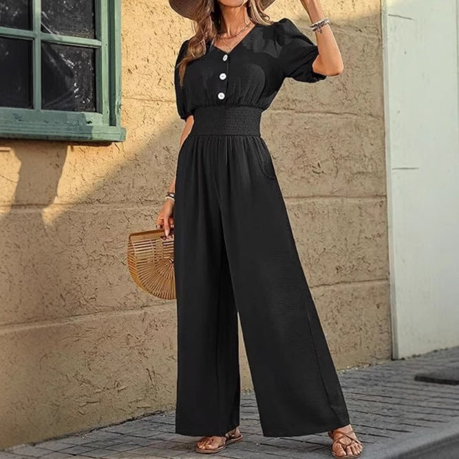 Dame jumpsuit med elastisk talje og knapdetalje Stilla