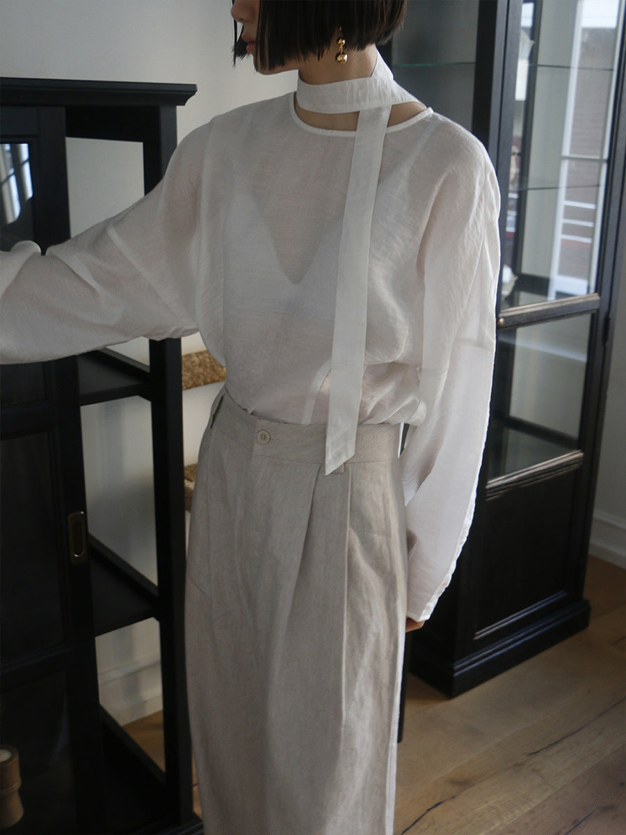 Dame afslappet indpakningsoverdel med elegant design og taljerbar bælte Stilla