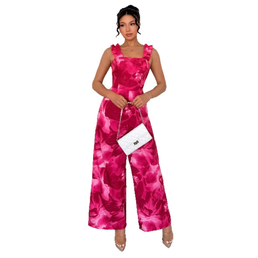 Dame jumpsuit med floral design og raffinerede flæsedetaljer Stilla
