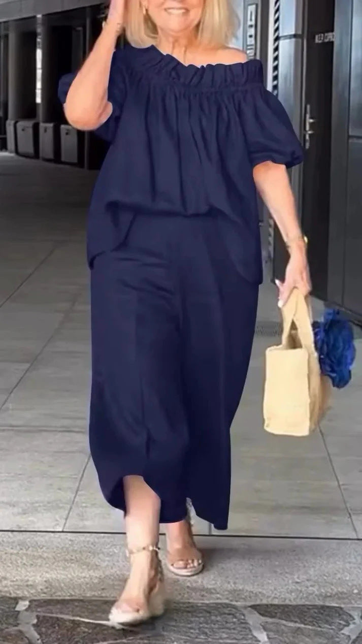 Dame luftig jumpsuit-sæt med voluminøse ærmer og raffineret taljering Stilla