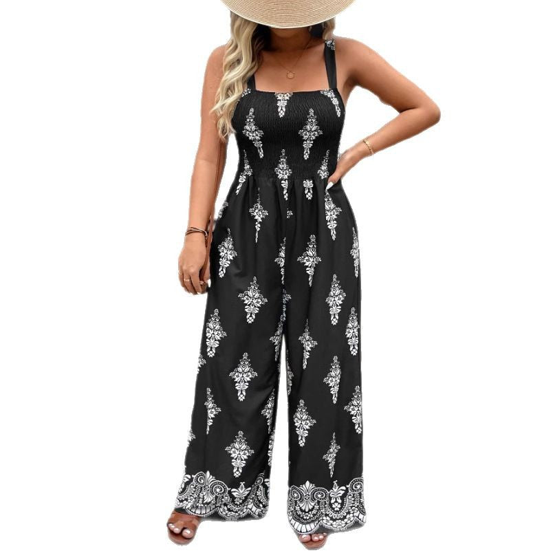 Dame jumpsuit med elegant blomstret design og bredt ben Stilla