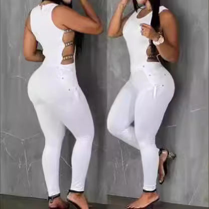 Dame jumpsuit med sideløse cut-outs og glamourøse accenter Stilla