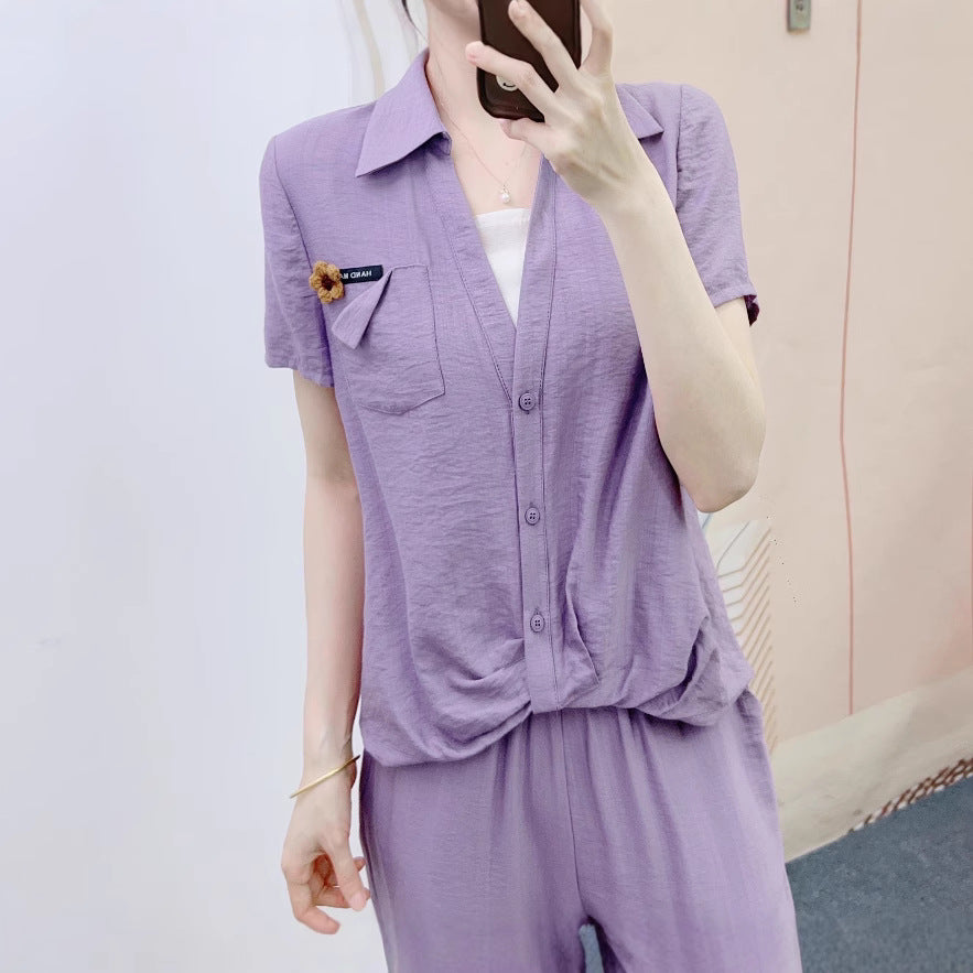 Dame afslappet jumpsuit med knapbart overdel og elegant taljebehandling Stilla