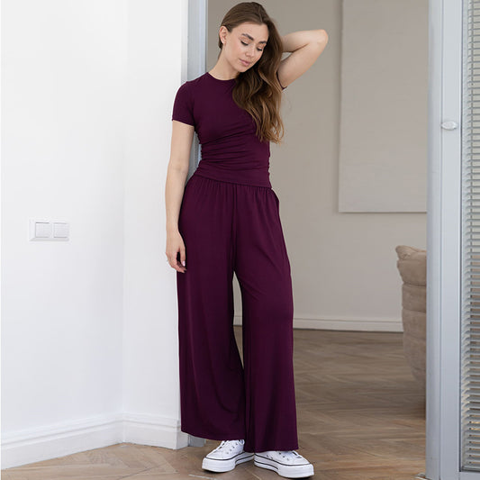 Dame elegant jumpsuit med figursyet overdel og vidde ben Stilla