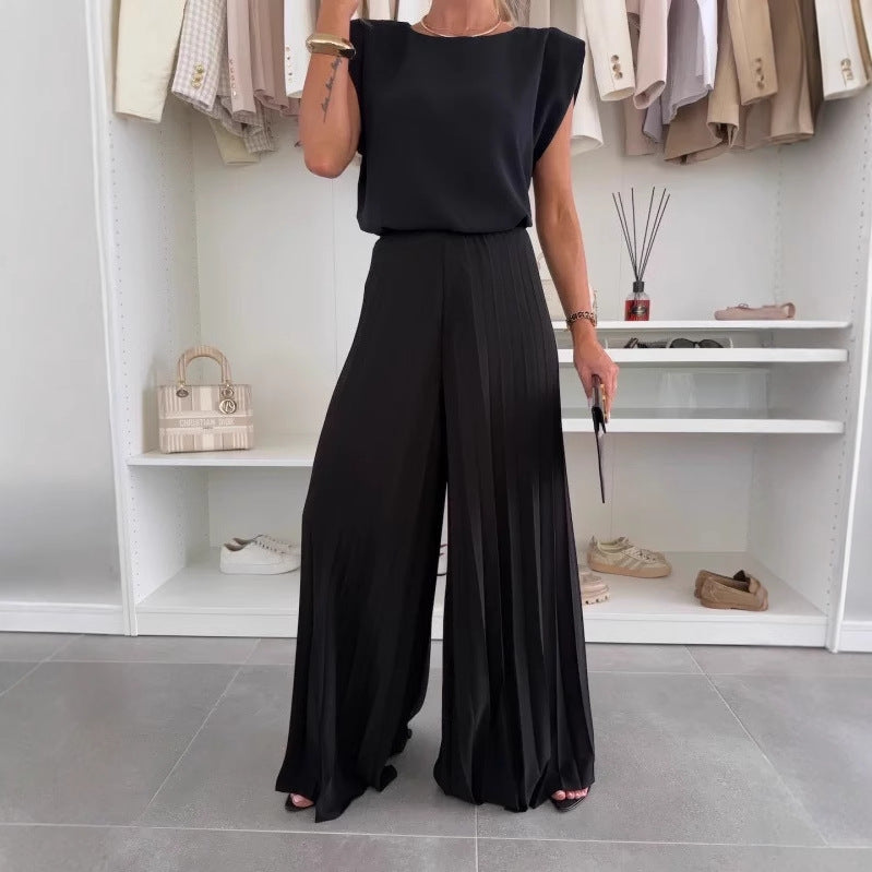 Dame jumpsuit med blomsterdesign og skulderpuder Stilla